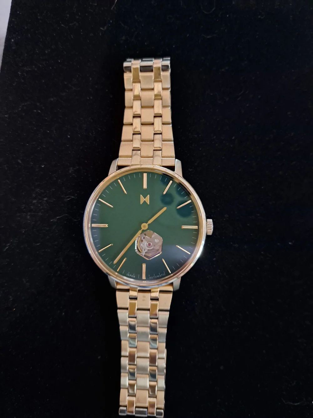 MVMT Gold Bracelet Watch with Green Dial and Open Heart